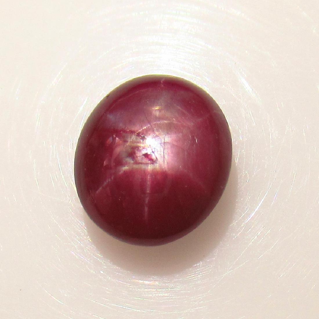 2.98 Ct Genuine Six Line Star Ruby Oval Cab: No Reserve! Title: 2.98 Ct Genuine Six Line Star Ruby Oval Cab Stone Clarity: Opaque Gemstones: Natural Star Ruby Carat Weights: 2.98 Size/Dimensions: 8.40 x 7.30 x 4.40 mm Additional Information: Dee