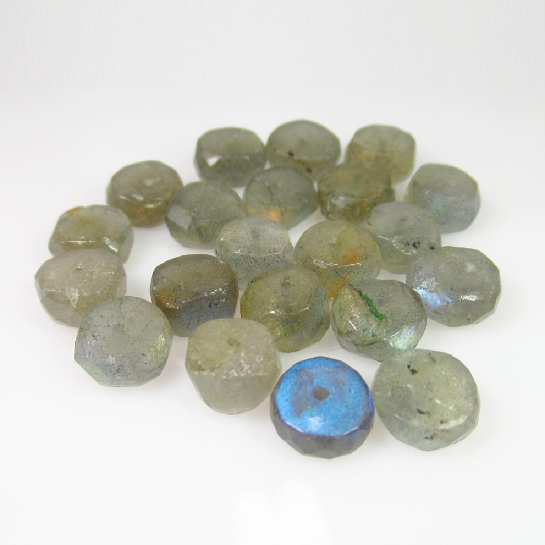 46.92 Ct Genuine 21 Labradorite Drilled Round Beads: No Reserve! Title: 46.92 Ct Genuine 21 Labradorite Drilled Round Beads Stone Clarity: Transparent Gemstones: Natural Labradorite Carat Weights: 46.92 Size/Dimensions: 7.50 to 8.10 mm / 21 PC's Additio