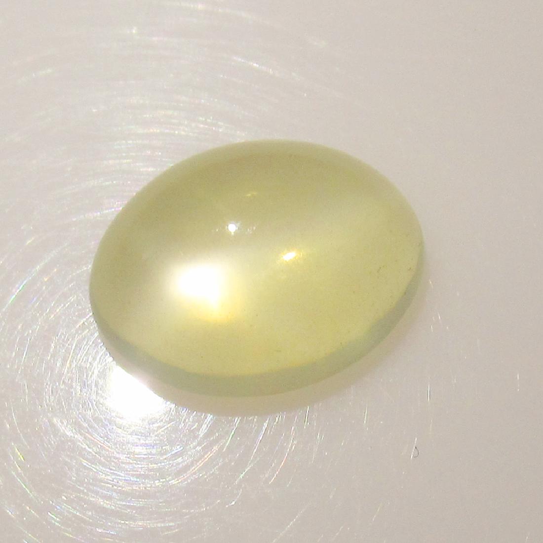 3.78 Ct Genuine Moonstone Catseye 12X11 mm Oval Cut: No Reserve! Title: 3.78 Ct Genuine Moonstone Catseye 12X11 mm Oval Cut Stone Clarity: Transparent Gemstones: Natural Moonstone Catseye Carat Weights: 3.78 Size/Dimensions: 11.90 x 9.90 x 5.10 mm Addit