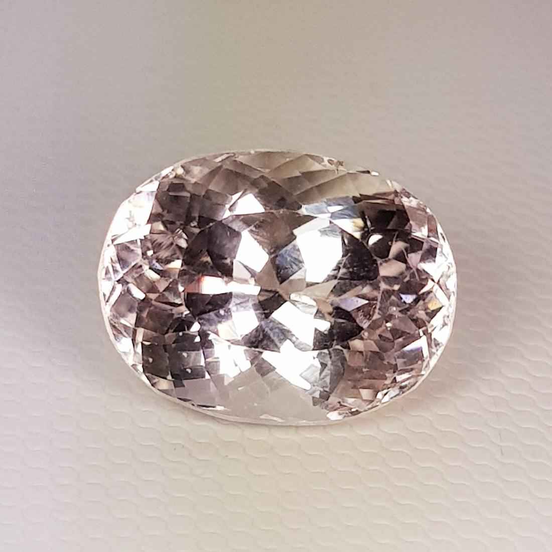 Natural Spodumene Oval Cut - 9.60 ct: No Reserve! Title: Natural Spodumene Oval Cut - 9.60 ct Color/Clarity: IF - VVS Gemstones: Gemstones Carat Weights: $10 Size/Dimensions: 14.30 x 10.95 x 9.20 Additional Information: Oval - Afghanistan