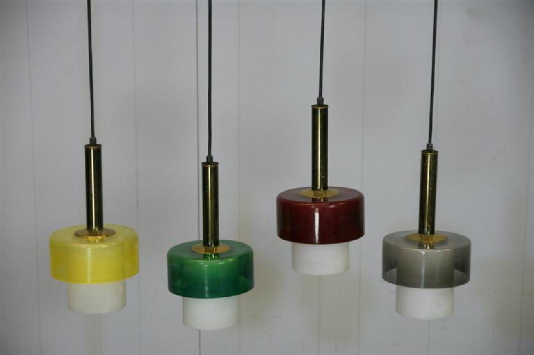4 Italian Pendant Lights: Condition; Good; Dimensions; Height: 34" / 86.36cm Diameter: 6.5" / 16.51cm; No. of Items; 4; Description; 4 Italian Pendant Lights May be hung individually or together. Plastic and glass. Comes with 