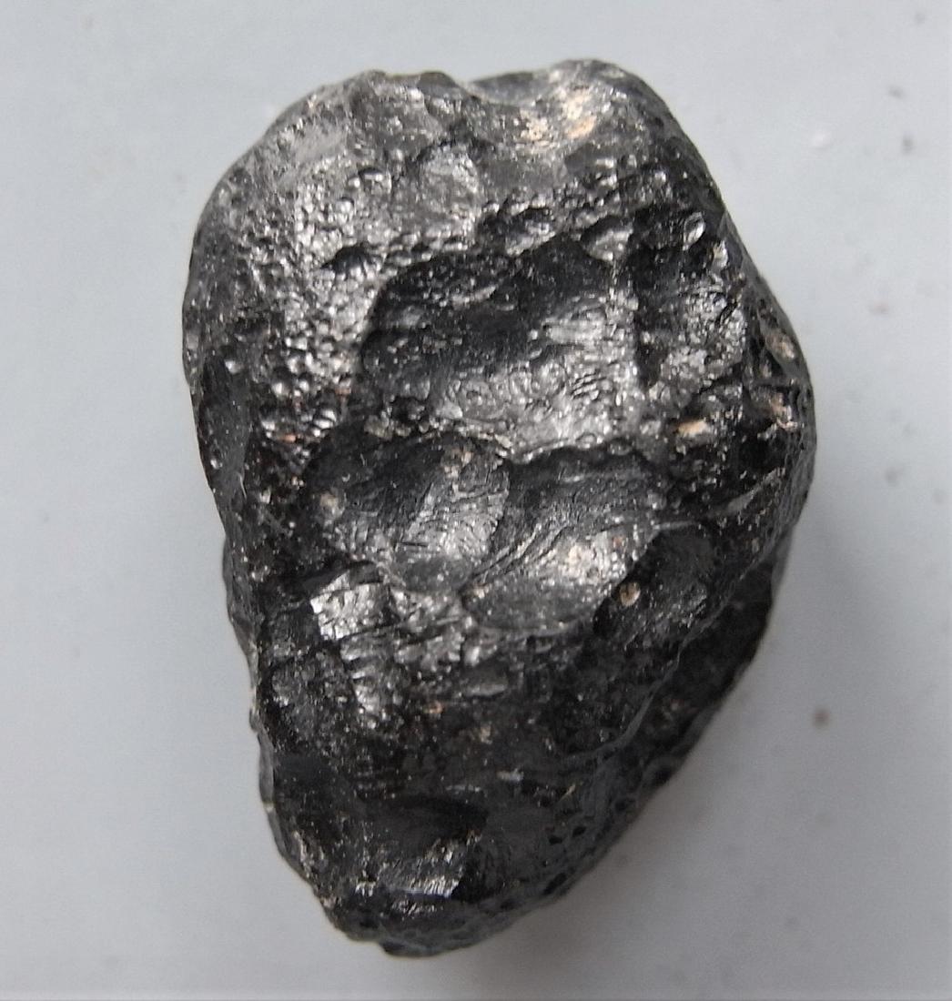 THAILANDITE TEKTITE - FROM METEORITE IMPACT - FLAWLESS: Title: THAILANDITE TEKTITE - FROM METEORITE IMPACT - FLAWLESS Origin: Noen Sa-nga, Chaiyaphum Prov. Thailand Size: 2.2x1.5x1.3 cm / 6 gram Additional Information: elongate & rounded, glossy thailandit