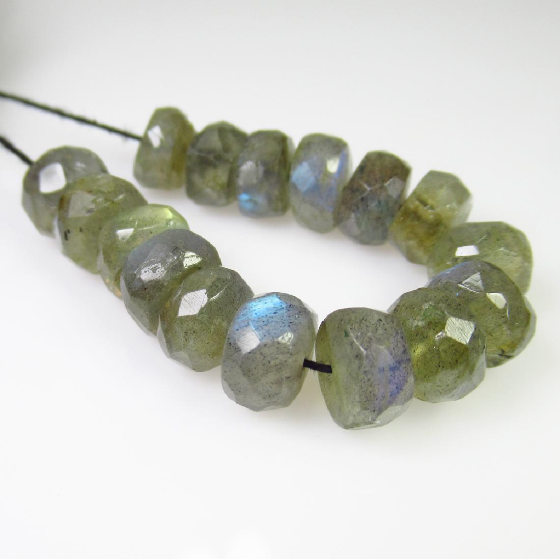 37.64 Ctw Natural 16 Labradorite Drilled Round Beads: No Reserve! Title: 37.64 Ctw Natural 16 Labradorite Drilled Round Beads Stone Clarity: Transparent Loose Gemstone: Labradorite Carat Weights: 37.64 Size/Dimensions: 7.50 to 8.00 mm / 16 PC's Drilled R