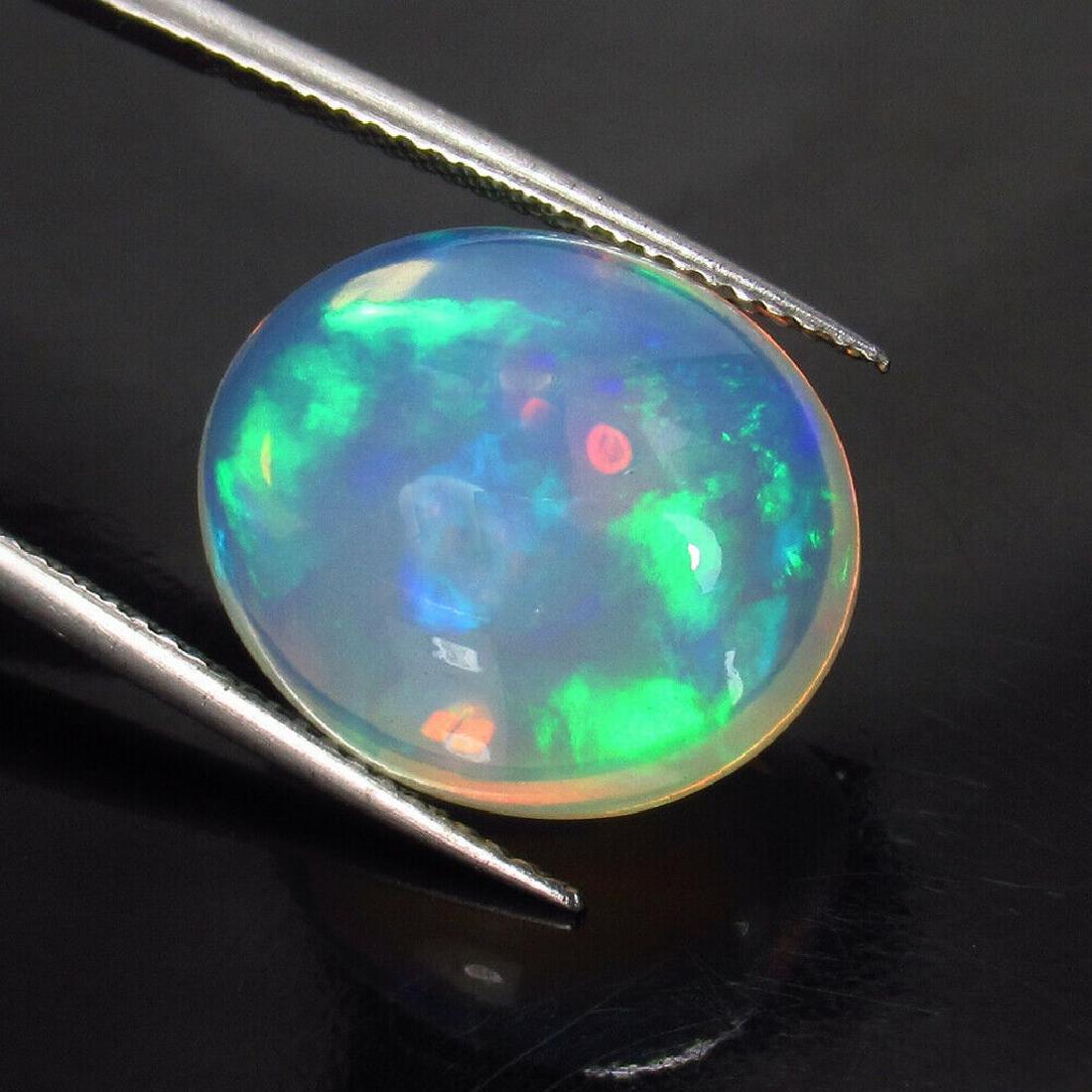 9.28 Ct Genuine Multi-Color Fire Opal Oval Cab (1 of 2)