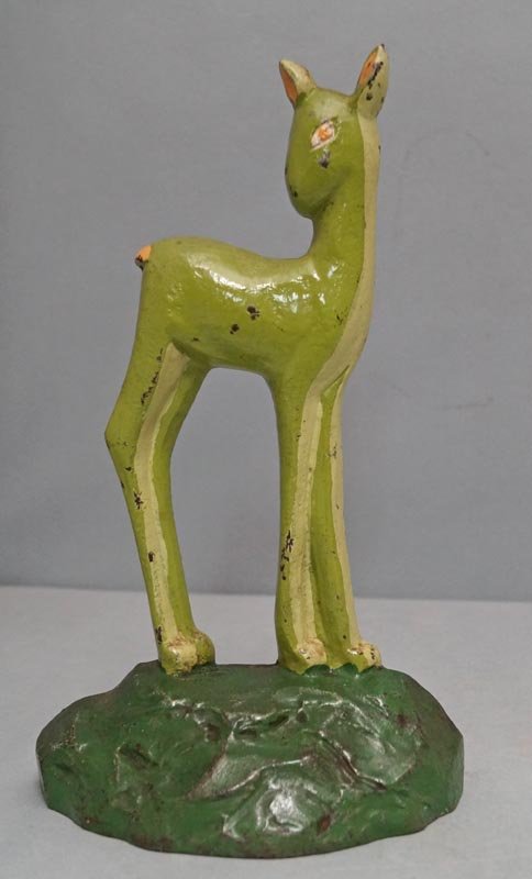 Antique Deer Cast Iron Art Deco Doorstop 1930: Title: Antique Deer Cast Iron Art Deco Doorstop 1930 Dimension: 9 7/8" H. x 5 3/8" W. Provenance:An Antique Cast Iron Fawn, Doe, Deer Doorstop. Painted in different shades of Deco green. Eye-appealing