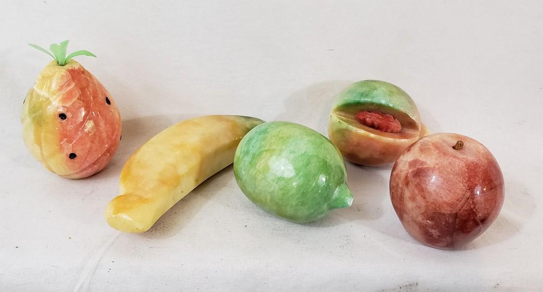 Five pieces of mid 20th century alabaster stone fruit.: Title: Five pieces of mid 20th century alabaster stone fruit. Dimension: Banana 6" long Provenance:Includes a pineapple, banana, lime, peach with pit showing and an apple. All in excellent condition. 