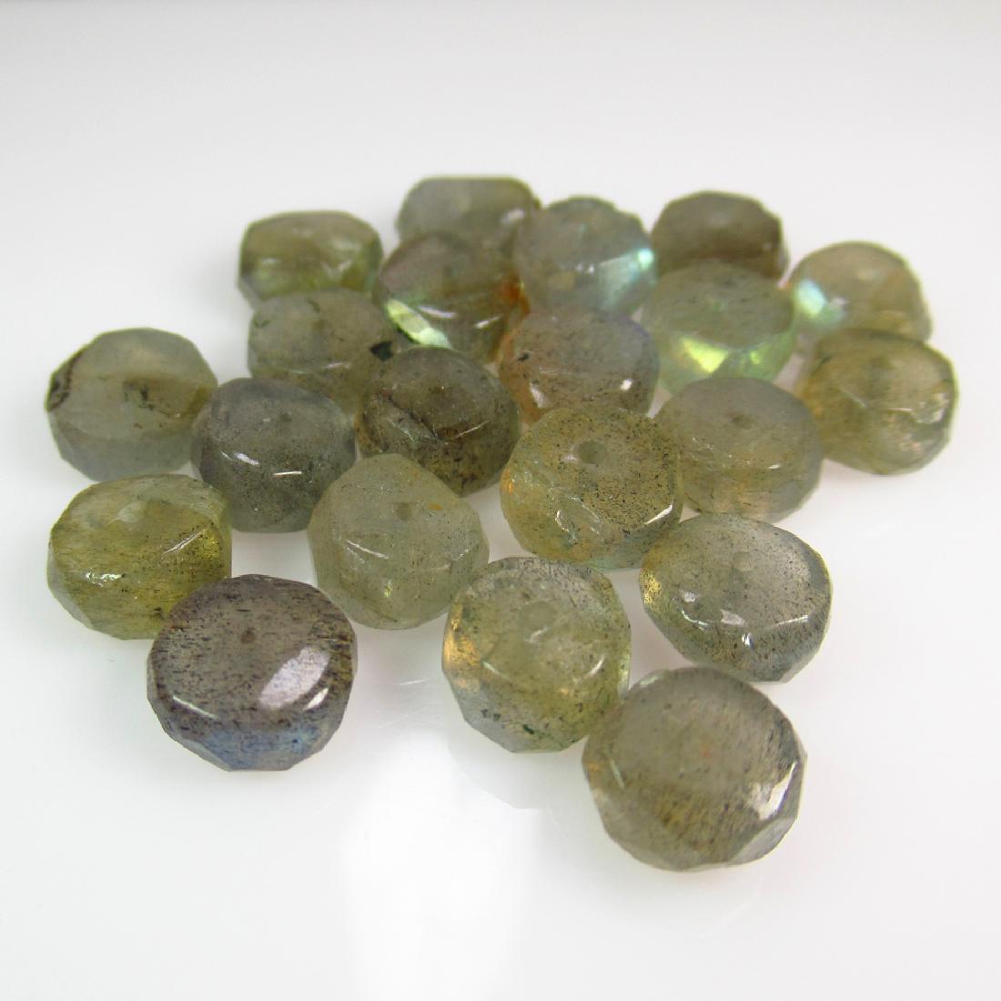 46.85 Ctw Natural 21 Labradorite Drilled Round Beads: No Reserve! Title: 46.85 Ctw Natural 21 Labradorite Drilled Round Beads Stone Clarity: Transparent Gemstones: Labradorite Carat Weights: 46.85 Size/Dimensions: 7.30 to 8.30 mm / 21 PC's Additional Inf