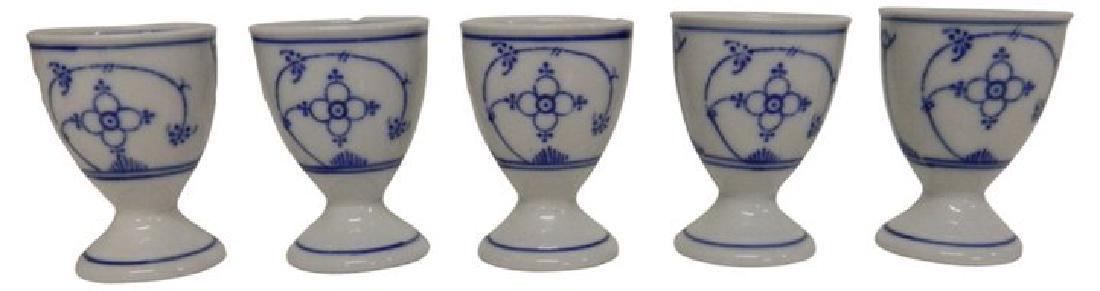 Blue/White Eggcups, S/5: Set of 5 vintage mid century egg cups, each hand painted with Scandinavian blue/white floral pattern. No makers mark, Each 2.5" H X 1.75" D Reserve: $65.00 Shipping: Domestic: Flat-rate of $12.00 to a