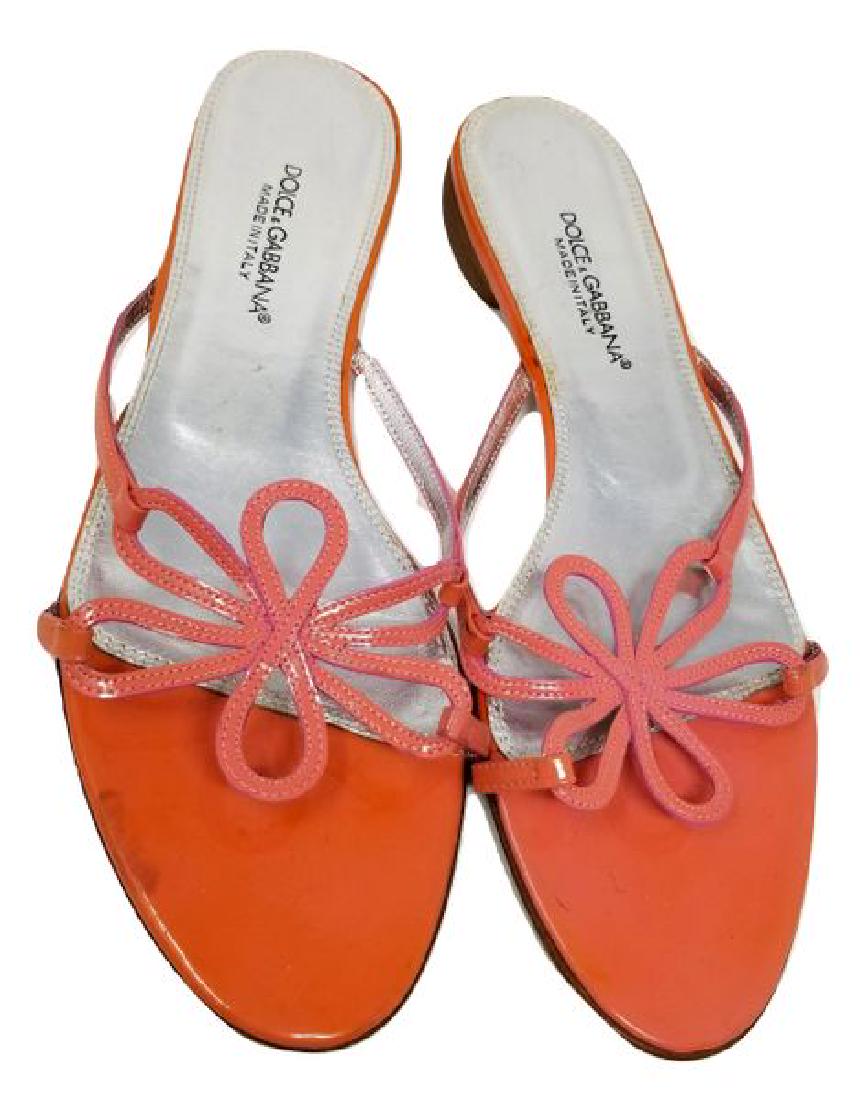 Dolce and Gabbana Sandals Tangerine Orange Leather Made: Dolce and Gabbana Sandals Tangerine Orange Italian Leather Size 40 We offer a pair of Dolce and Gabbana leather slip on sandals just in time for summer! This pair of sandals are marked Made in Italy a