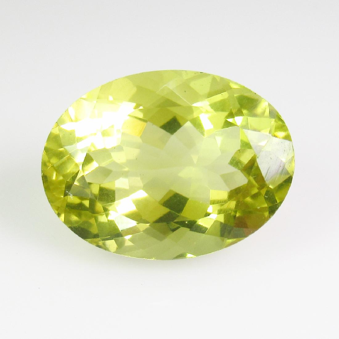 9.68 Ct Genuine Lemon Quartz 16X12 mm Oval Cut: No Reserve! Title: 9.68 Ct Genuine Lemon Quartz 16X12 mm Oval Cut Stone Clarity: VVS Gemstones: Natural Lemon Quartz Carat Weights: 9.68 Size/Dimensions: 16.00 x 12.00 x 8.80 mm Additional Information