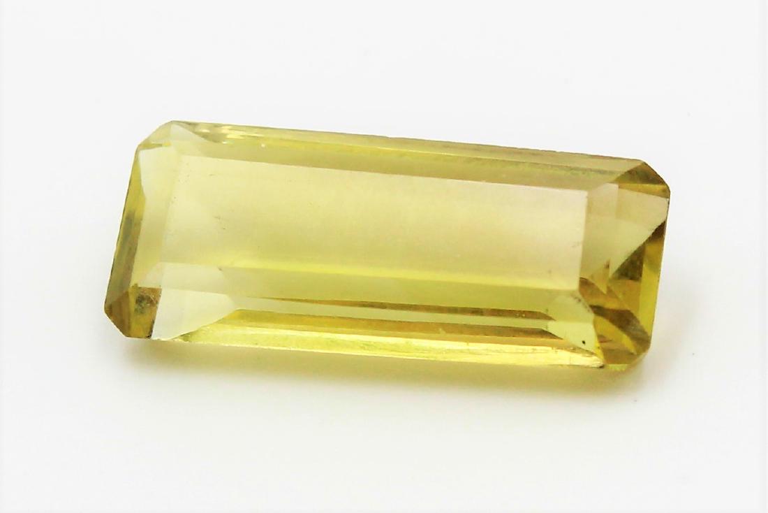 Lemon Quartz of 8.59 ct: No Reserve! Title:Lemon Quartz of 8.59 ct Brand:Colored Gemstones Metal Purity:VVS Gemstones:Lemon Quartz Carat Weights:8.59 ct Size/Dimensions:21.00 x 9.10 x 6.50 mm Shipping: Domestic: Flat-rate of 