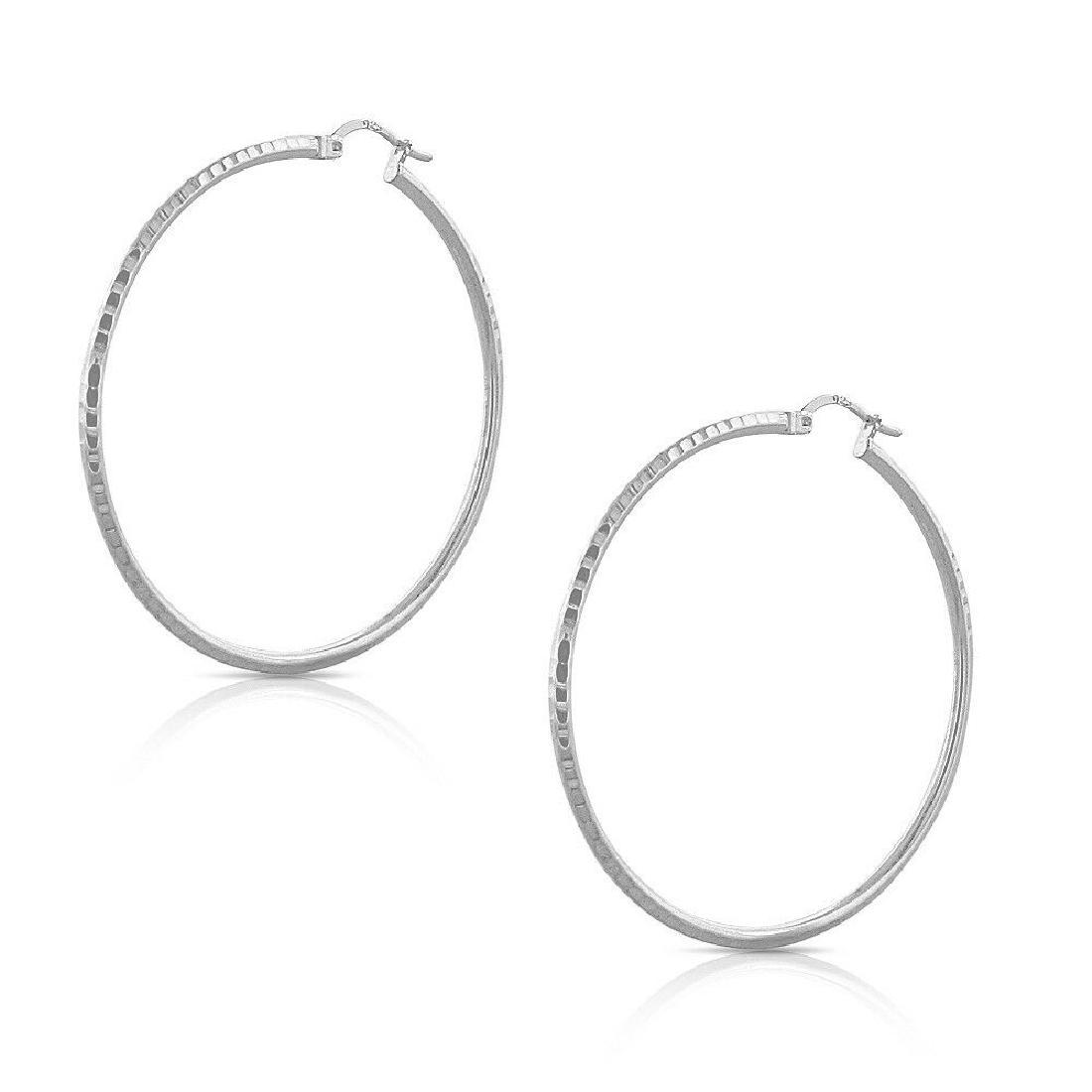 925 STERLING SILVER CHARLES GARNIER NARDINI ROUND HOOP: 925 STERLING SILVER CHARLES GARNIER NARDINI ROUND HOOP EARRINGS 1.40" 35575SHCS 925 STERLING SILVER CHARLES GARNIER NARDINI ROUND HOOP EARRINGS 1.40" 35575SHCS Click images to enlarge Description Bran