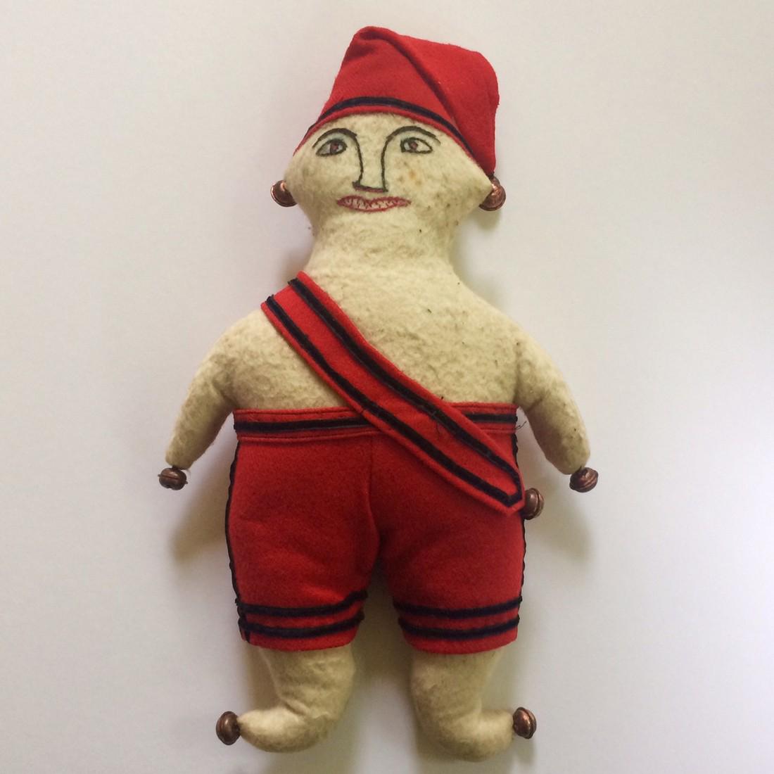 Ca. 1920 Handmade Stuffed Elf Doll: Title: Ca. 1920 Handmade Stuffed Elf Doll Date/Period: c. 1920 Material: wool, flannel, velvet Dimension: 18" tall with cap extended. 9" width X 3" thickness Provenance:Elf doll constructed of red woo