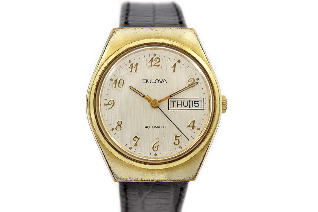 Vintage Bulova N9 Classic Gold Plated Automatic Mens: Title: Vintage Bulova N9 Classic Gold Plated Automatic Mens Watch Date: 1970s Model: Classic Movement: 17 Jewles Automatic Functions: time day and date Case Metal: Gold Plated Case Size: 34mm x40mm Di