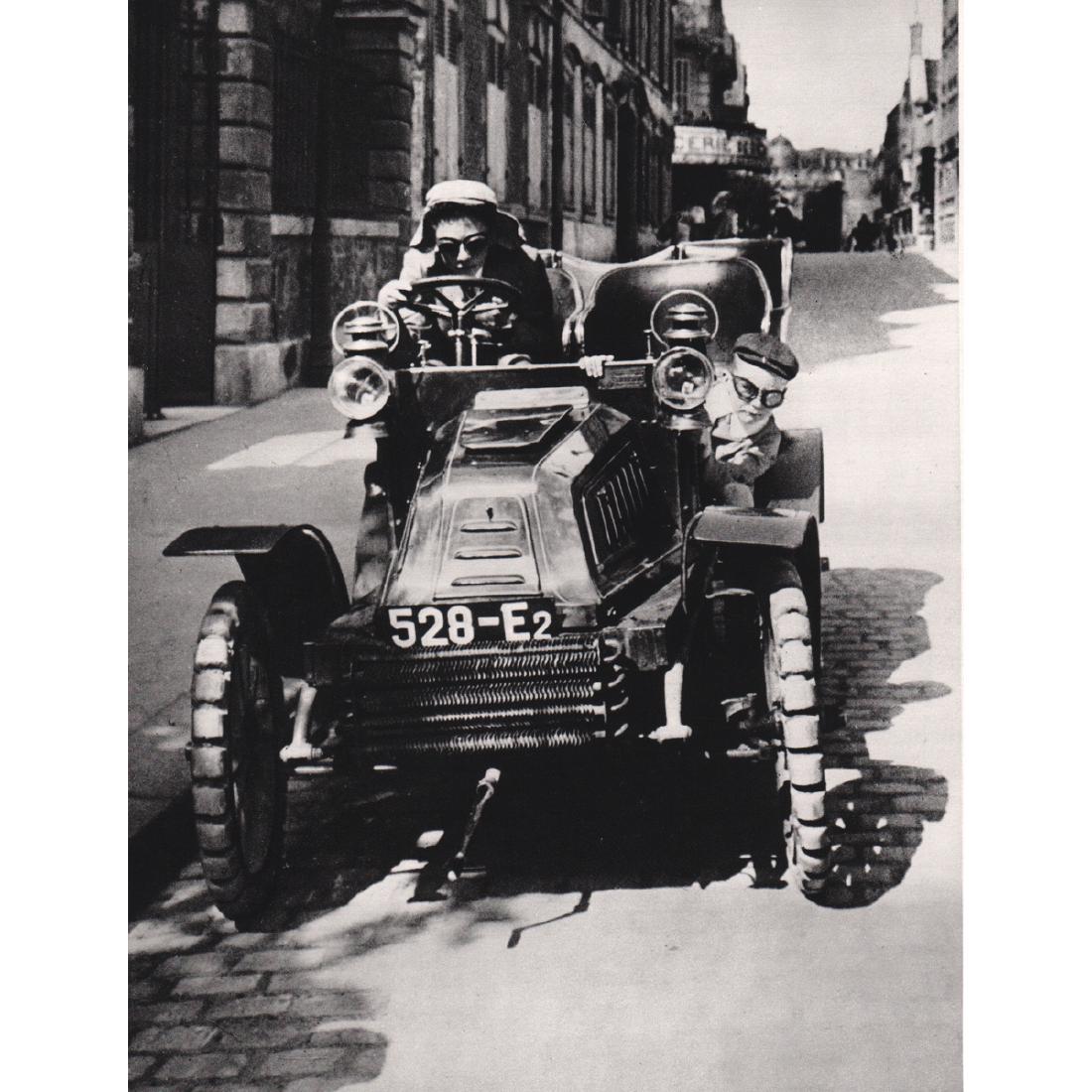 JACQUES HENRI LARTIGUE - Dion Bouton car: Artist: JACQUES HENRI LARTIGUE Print Title: Dion Bouton car with Ducasbles tires Medium: Sheet-fed Gravure Printing Date: 1970's Printed in France Image Size approx: 7 X 9.25 inches Jacques Henri Lart
