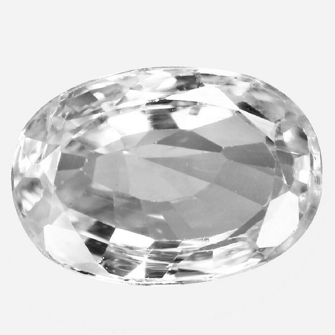 2.07Ct AAA~ EYE CATCHING FIRE NATURAL WHITE ZIRCON: Title: 2.07Ct AAA~ EYE CATCHING FIRE NATURAL WHITE ZIRCON Color/Clarity: white/VVS Gemstone Type: natural/unheated Carat Weights: 2.07 Size/Dimensions: 8.19 x 6.20 x 3.39 MM Origin: Cambodia Reserve: 
