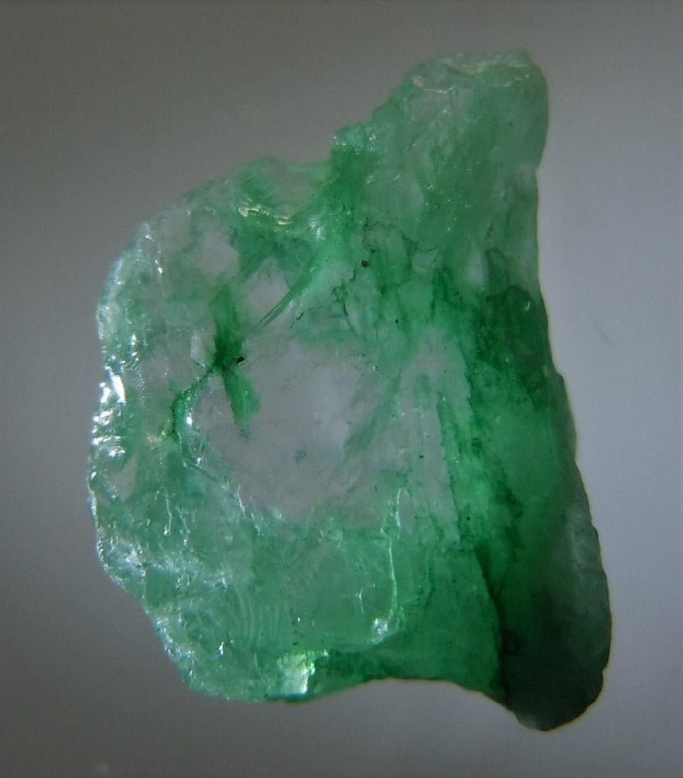 3.3 CT CLEAR EMERALD - UNTREATED GEMSTONE: Title: 3.3 CT CLEAR EMERALD - UNTREATED GEMSTONE Origin: Chivor Mine, Bayaco Dist. Colombia Size: 1.3x0.86x0.4 cm / 0.66 gram Additional Information: clear, green to colorless emerald Reserve: $2.00 S