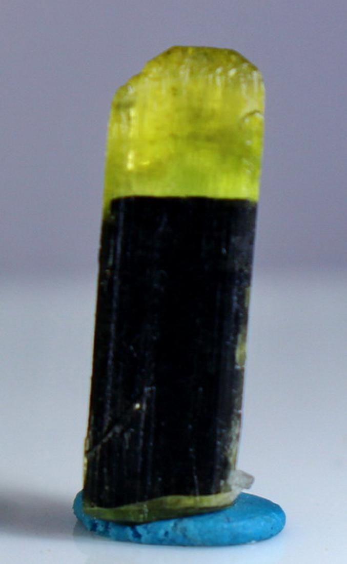 Natural & Unheated~ Green Cap Tourmaline Crystal: Title: Natural & Unheated~ Green Cap Tourmaline Crystal Color/Clarity: Green Gemstone Type: Crystal Carat Weights: 5.30 CTs Size/Dimensions: 18x5x5 mm Reserve: $15.99 Shipping: Domestic: Flat-rate of