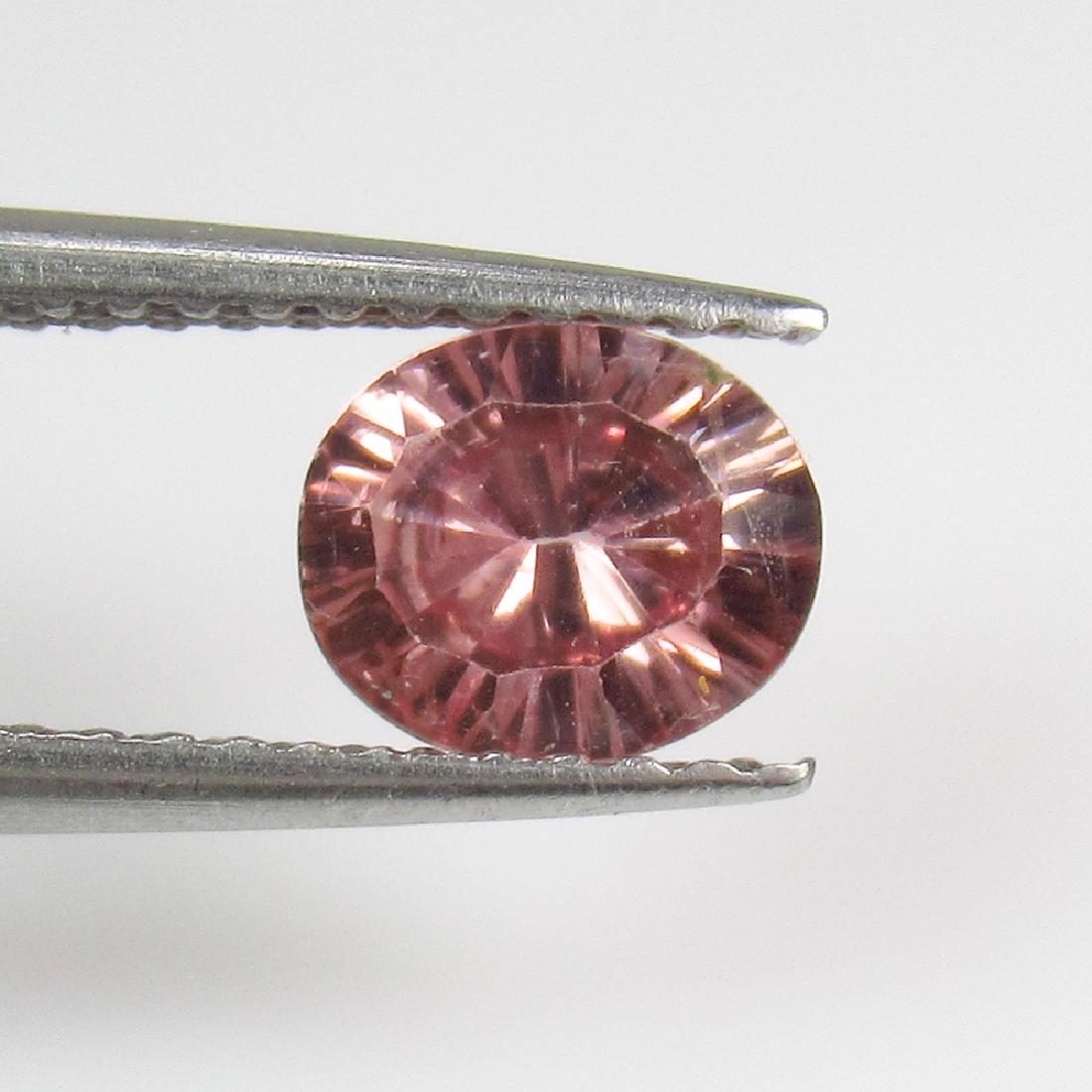 0.79 Ctw Natural Burma Pink Spinel Oval Concave Cut: No Reserve! Title: 0.79 Ctw Natural Burma Pink Spinel Oval Concave Cut Stone Clarity: VVS Gemstones: Spinel Carat Weights: 0.79 Size/Dimensions: 6.30 x 5.40 x 3.50 mm Additional Information: Brilliant