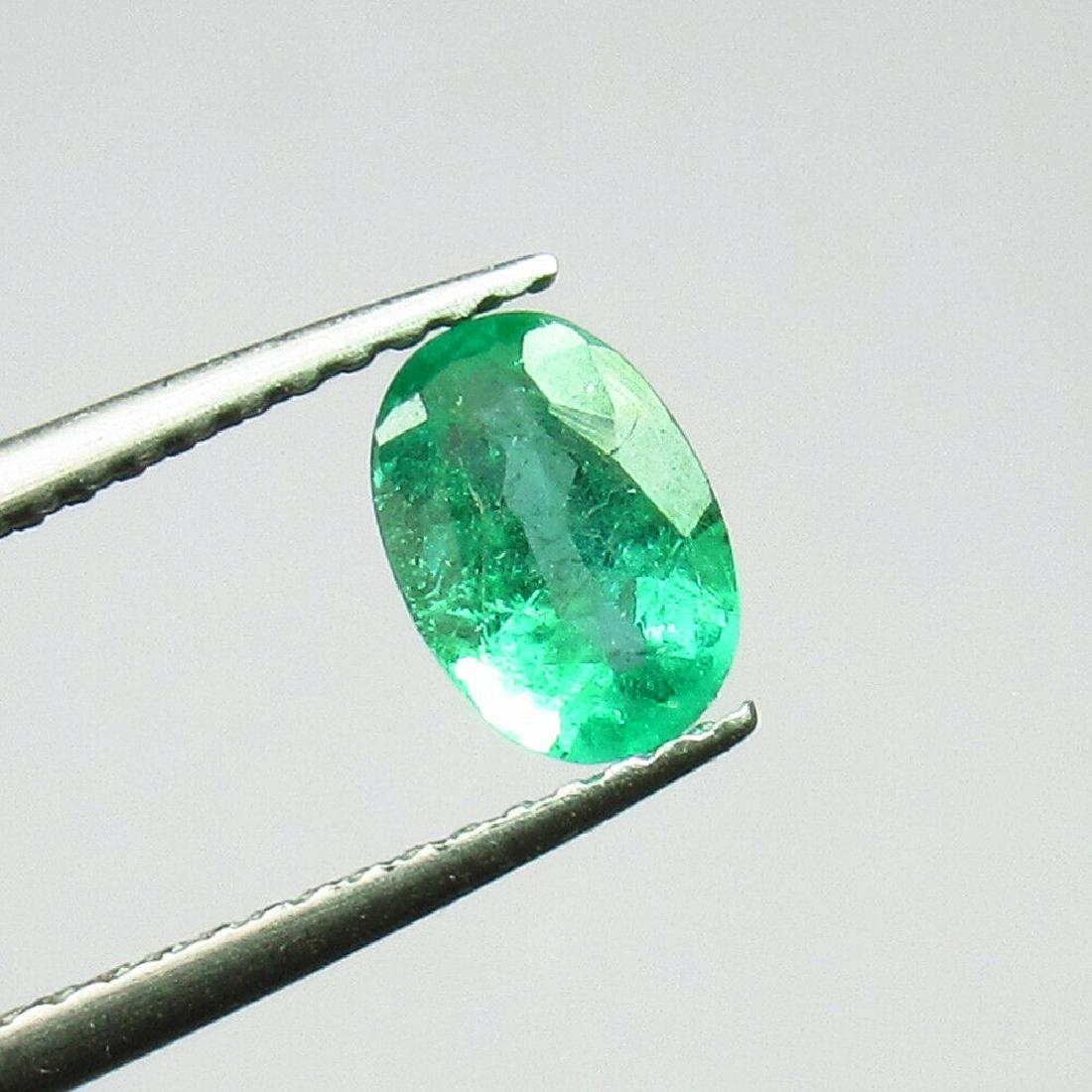 0.64 Ct Genuine Zambian Emerald 7X5 mm Oval Cut (1 of 2)