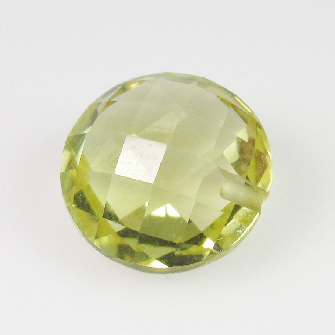 3.71 Ct Genuine Drilled Lemon Quartz 10 mm Round Cut: No Reserve! Title: 3.71 Ct Genuine Drilled Lemon Quartz 10 mm Round Cut Stone Clarity: VVS Gemstones: Natural Lemon Quartz Carat Weights: 3.71 Size/Dimensions: 10.00 x 10.00 x 6.10 mm Additional Infor