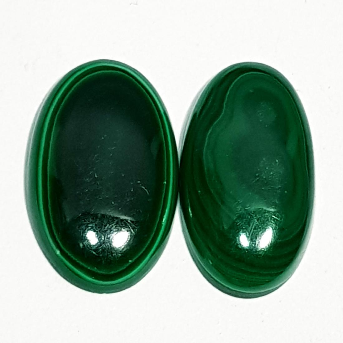 22.70 ct Pair of Natural Malachite: No Reserve! Title: 22.70 ct Pair of Natural Malachite Color/Clarity: Opaque Gemstones: Loosegemstone Carat Weights: $23 Size/Dimensions: 20.50 x 11.30 x 4.50/20.30 x 12.50 x 3.70 Additional Informatio