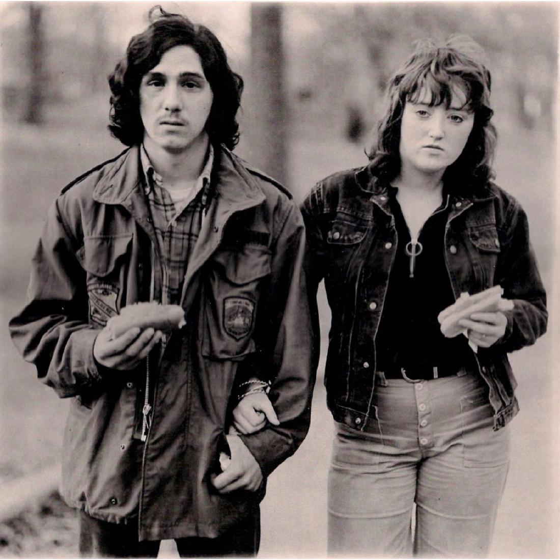 DIANE ARBUS - Young Man and his Girlfriend: Artist: DIANE ARBUS Print Title: Young Man and his Girlfriend with Hot Dogs in the Park, NY 1971 Limited Edition folio 288/1000 Medium: Sheet-Fed Gravure Printed in 1970's Printed in Italy Image Size:
