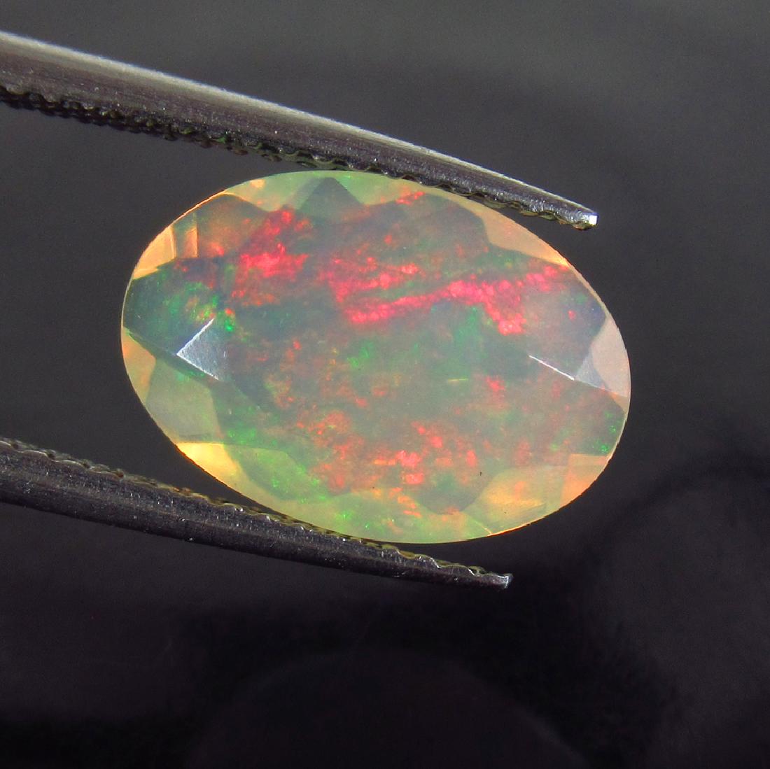 2.15 Ct Genuine Multi-Color Fire Faceted Opal Oval Cut (1 of 3)