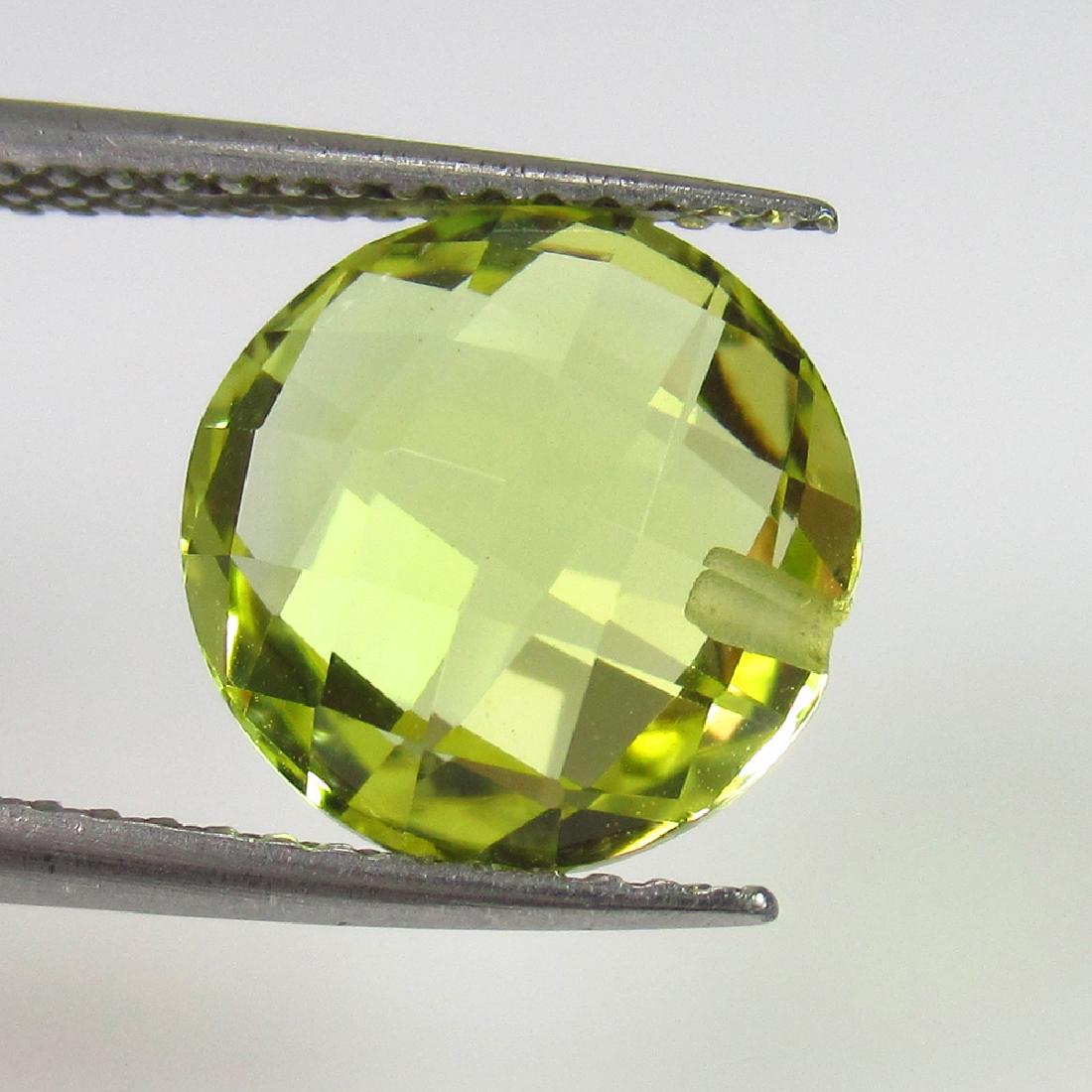 3.58 Ct Natural Lemon Quartz 10 mm Round Cut: No Reserve! Title: 3.58 Ct Natural Lemon Quartz 10 mm Round Cut Stone Clarity: VVS Gemstones: Natuarl Lemon Quartz Carat Weights: 3.58 Size/Dimensions: 10.00 x 10.00 x 6.40 mm Additional Information: 