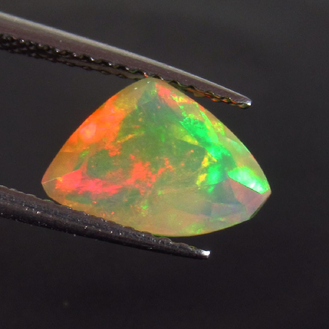 1.49 Ct Genuine Multi-Color Fire Faceted Opal Fancy Cut (1 of 2)