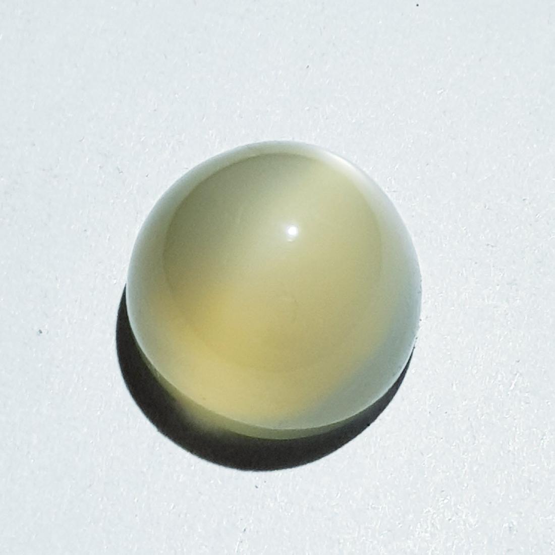 13.00 ct Natural Peach Orange Moonstone Cat's Eye: No Reserve! Title: 13.00 ct Natural Peach Orange Moonstone Cat's Eye Color/Clarity: Semi Transparent Gemstones: Loosegemstone Carat Weights: 13 Size/Dimensions: 13.60 x 13.60 x 9.80 Additional Informa