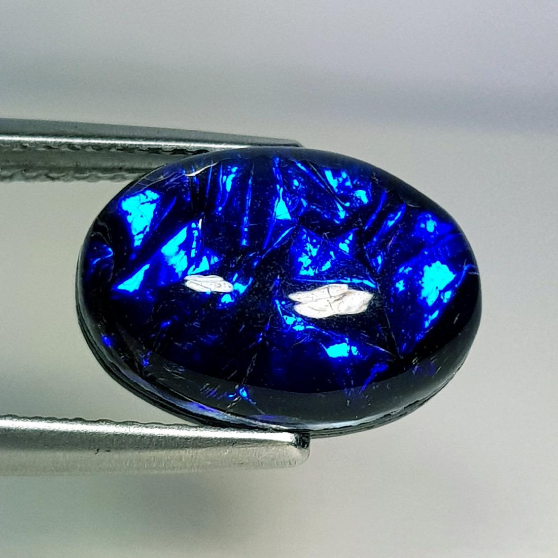 Australian Doublet Opal 5.95 ct: No Reserve! Title: Australian Doublet Opal 5.95 ct Color/Clarity: Semi Transparent Gemstones: Loosegemstone Carat Weights: 5.95 Size/Dimensions: 13.90 x 10.00 x 5.70 Additional Information: Oval - Aus