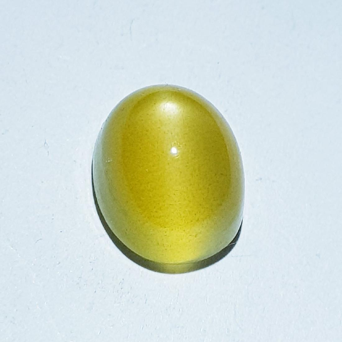 6.10 ct Natural Orange Moonstone: No Reserve! Title: 6.10 ct Natural Orange Moonstone Color/Clarity: Semi Transparent Gemstones: Loosegemstone Carat Weights: 6.1 Size/Dimensions: 11.50 x 9.60 x 7.70 Additional Information: Oval - Indi