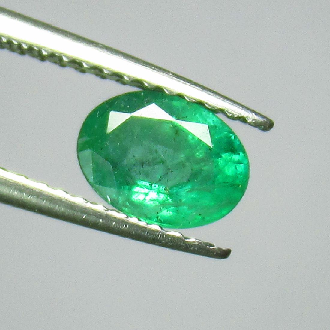 0.82 Ct Genuine Zambian Emerald 7X5 mm Oval Cut (1 of 2)