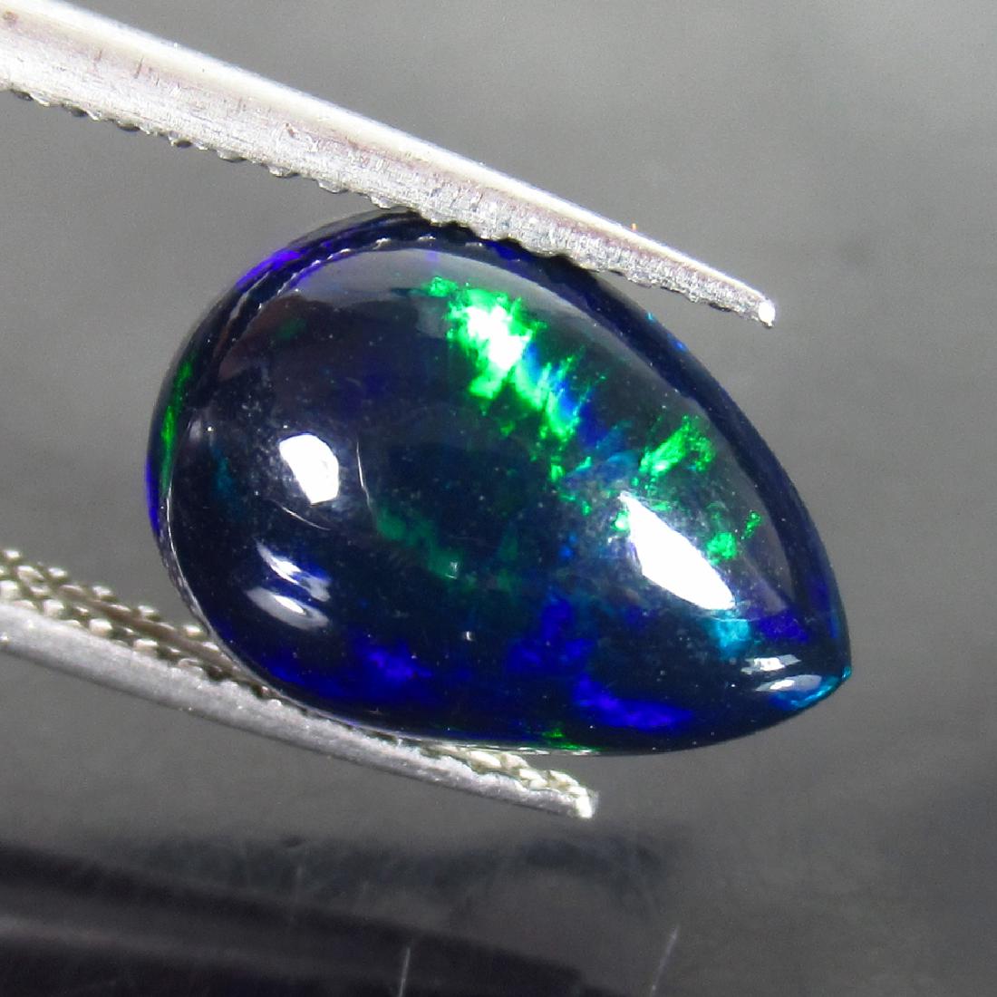 2.47 Ct Genuine Ethiopian Black Opal Pear Cab (1 of 2)