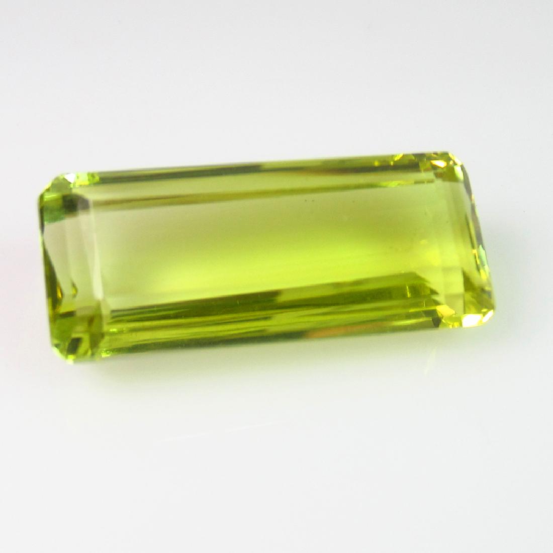 15.18 Ct Natural Lemon Quartz 23X10 mm Emerald Cut: No Reserve! Title: 15.18 Ct Natural Lemon Quartz 23X10 mm Emerald Cut Stone Clarity: VVS Gemstones: Natuarl Lemon Quartz Carat Weights: 15.18 Size/Dimensions: 23.00 x 9.90 x 7.60 mm Additional Informa