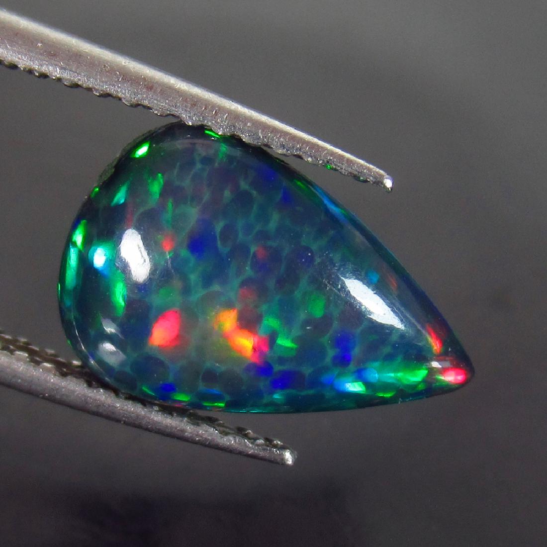 1.74 Ct Genuine Ethiopian Black Opal Pear Cab (1 of 2)