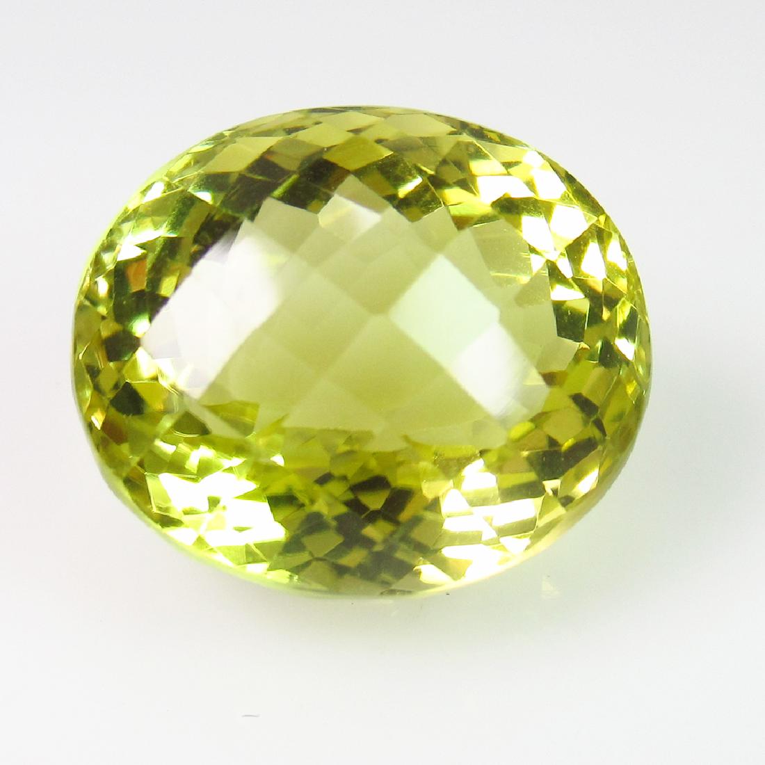 15.97 Ct Natural Lemon Quartz Oval Checkerboard Cut: No Reserve! Title: 15.97 Ct Natural Lemon Quartz Oval Checkerboard Cut Stone Clarity: VVS Gemstones: Natuarl Lemon Quartz Carat Weights: 15.97 Size/Dimensions: 16.30 x 13.80 x 12.10 mm Additional Info