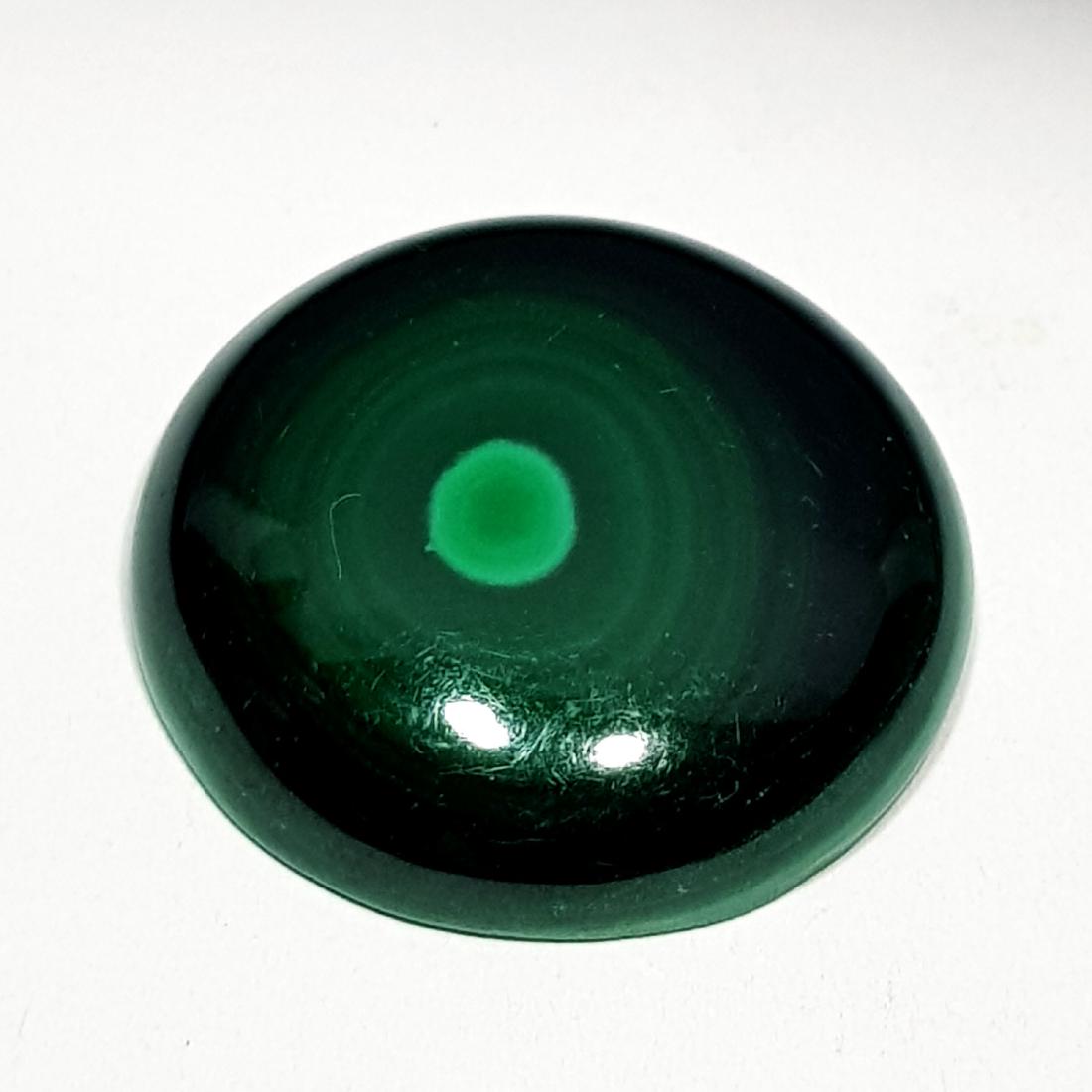 58.62 ct Natural Malachite: No Reserve! Title: 58.62 ct Natural Malachite Color/Clarity: Opaque Gemstones Carat Weights: 58.62 Size/Dimensions: 26.85 x 26.85 x 6.90Round - Africa Shipping: Worldwide: Flat-rate of $10.00 to anywh