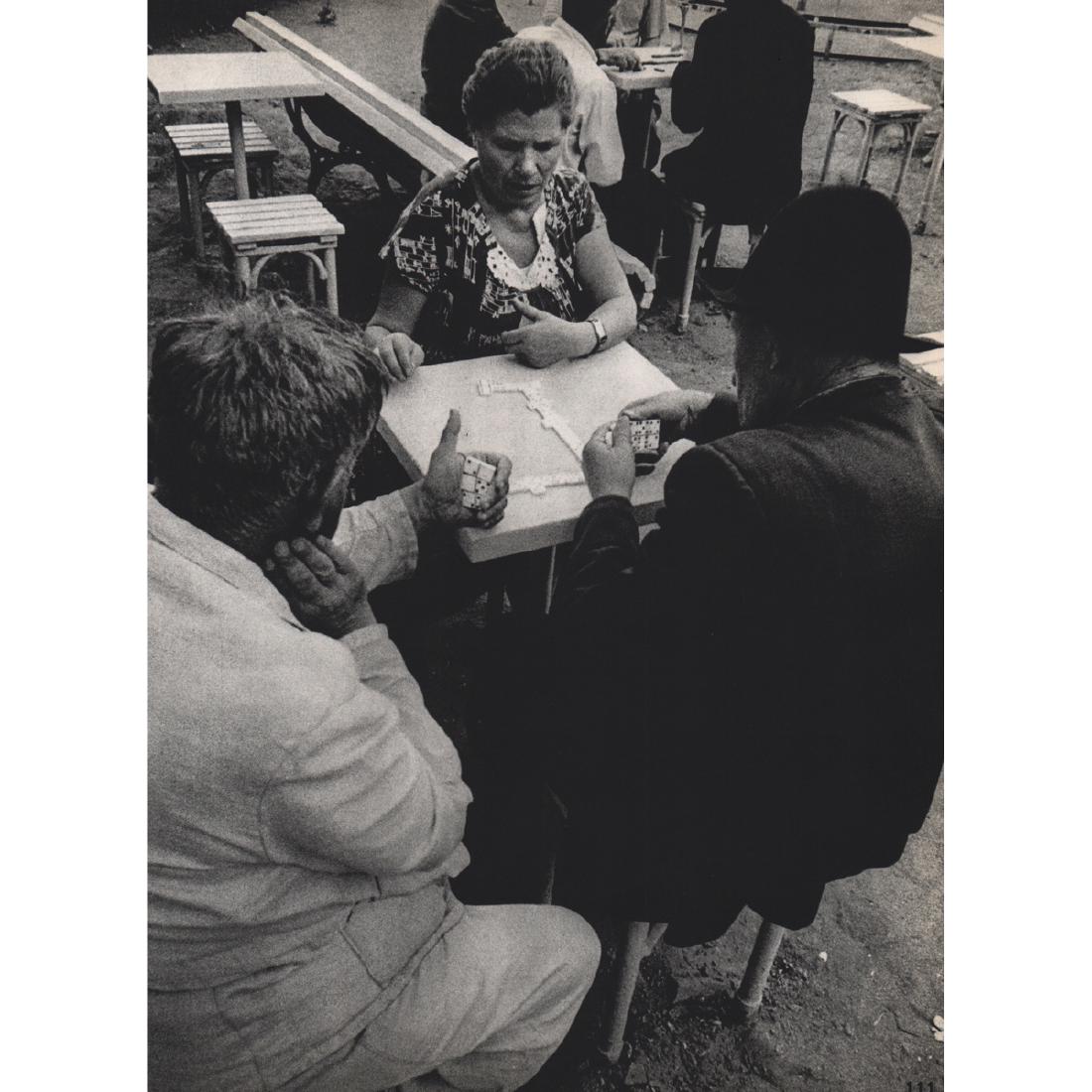 WILLIAM KLEIN - Dominos, Moscow: Artist: WILLIAM KLEIN Print Title: Dominos, Moscow Medium: Sheet-fed Gravure Printing Date: 1960's Printed in Japan Image Size Approx. 9.5 X 13 inches William Klein an American-born French photographe