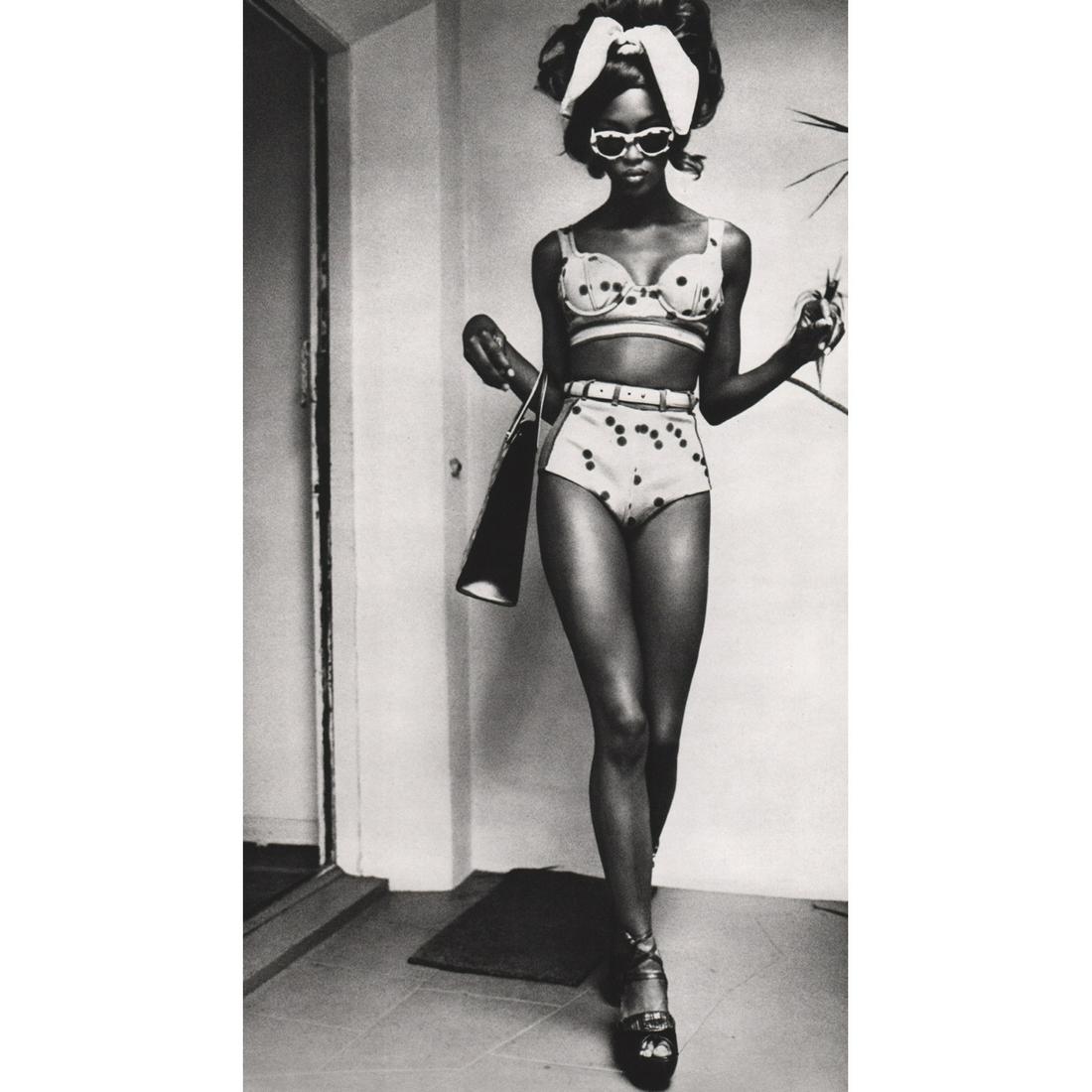 ELLEN VON UNWERTH - Naomi in Polka Dots, Miami 1990: Artist: ELLEN VON UNWERTH Print Title: Naomi in Polka Dots, Miami 1990 Medium: Sheet-fed Gravure Printing Date: 1990's Printed in Japan Image size approx. 9 x 13.5 inches Ellen Von Unwerth is a photog