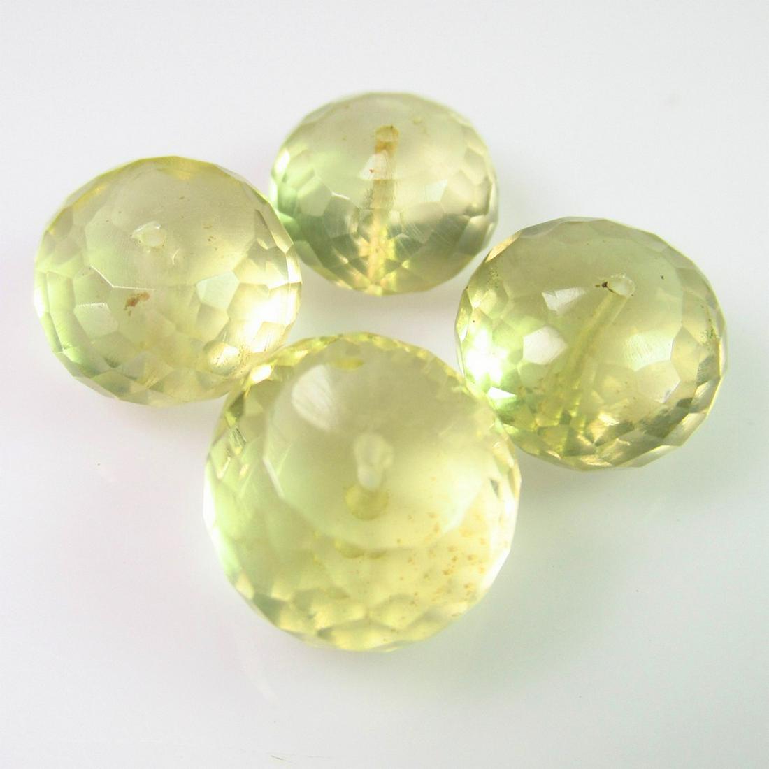 33.30 Ct Genuine 4 Drilled Lemon Quartz Round Beads: No Reserve! Title: 33.30 Ct Genuine 4 Drilled Lemon Quartz Round Beads Stone Clarity: Transparent Loose Gemstone: Natuarl Lemon Quartz Beads Carat Weights: 33.30 Size / Dimensions: 12.00 x 12.00 x 9.0