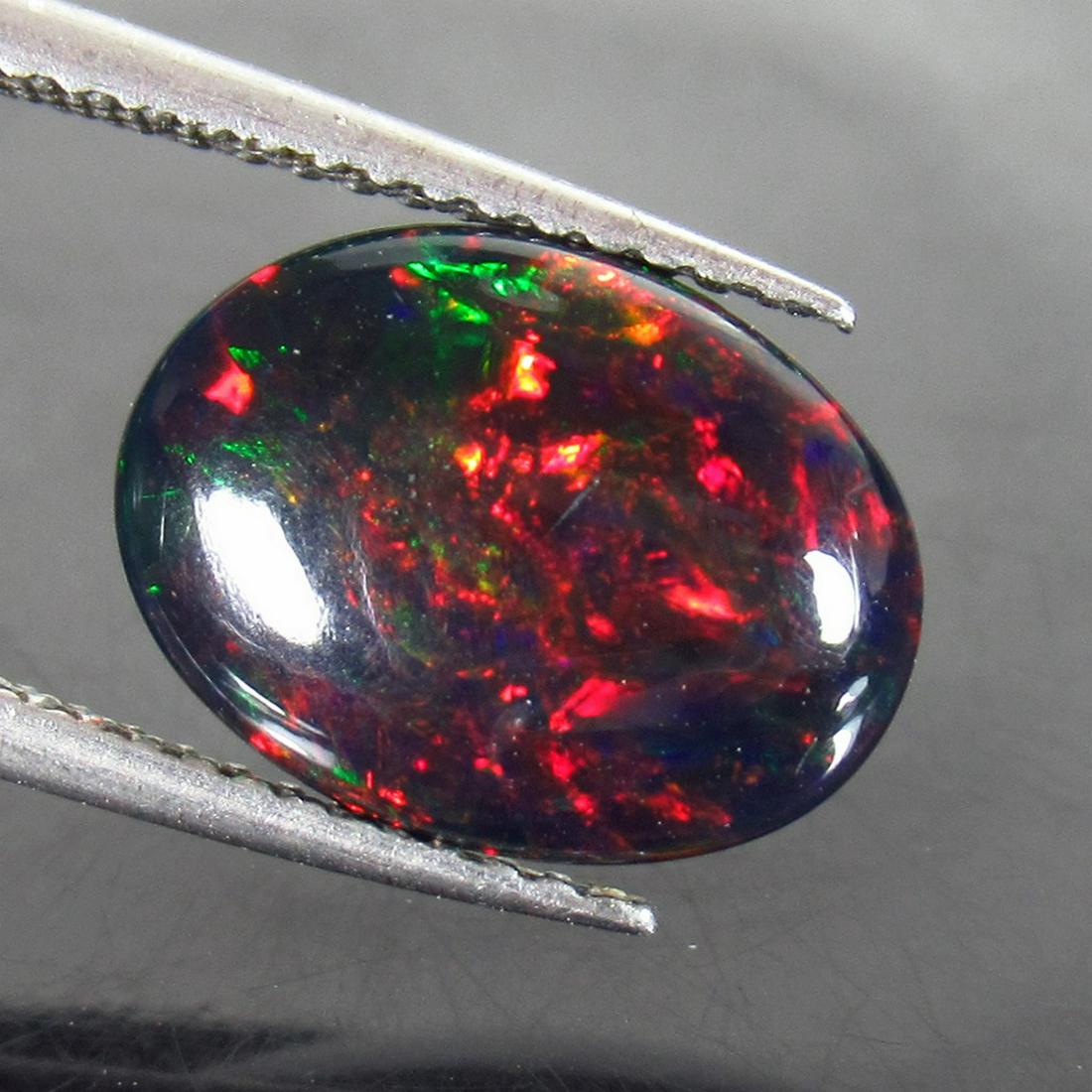 2.00 Ct Genuine Ethiopian Fire Black Opal Oval Cab (1 of 2)