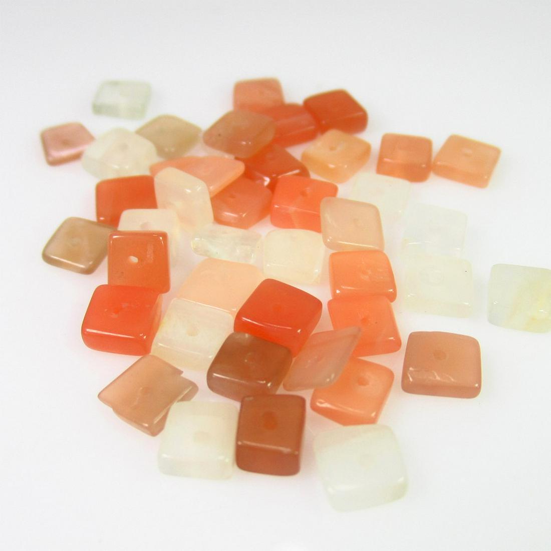 15.15 Ct Genuine 43 Drilled Moonstone Square Beads: No Reserve! Title: 15.15 Ct Genuine 43 Drilled Moonstone Square Beads Stone Clarity: Transparent Loose Gemstone: Natural Moonstone Beads Carat Weights: 15.15 Size / Dimensions: 4.2x4.2 to 4.8x4.8 mm /