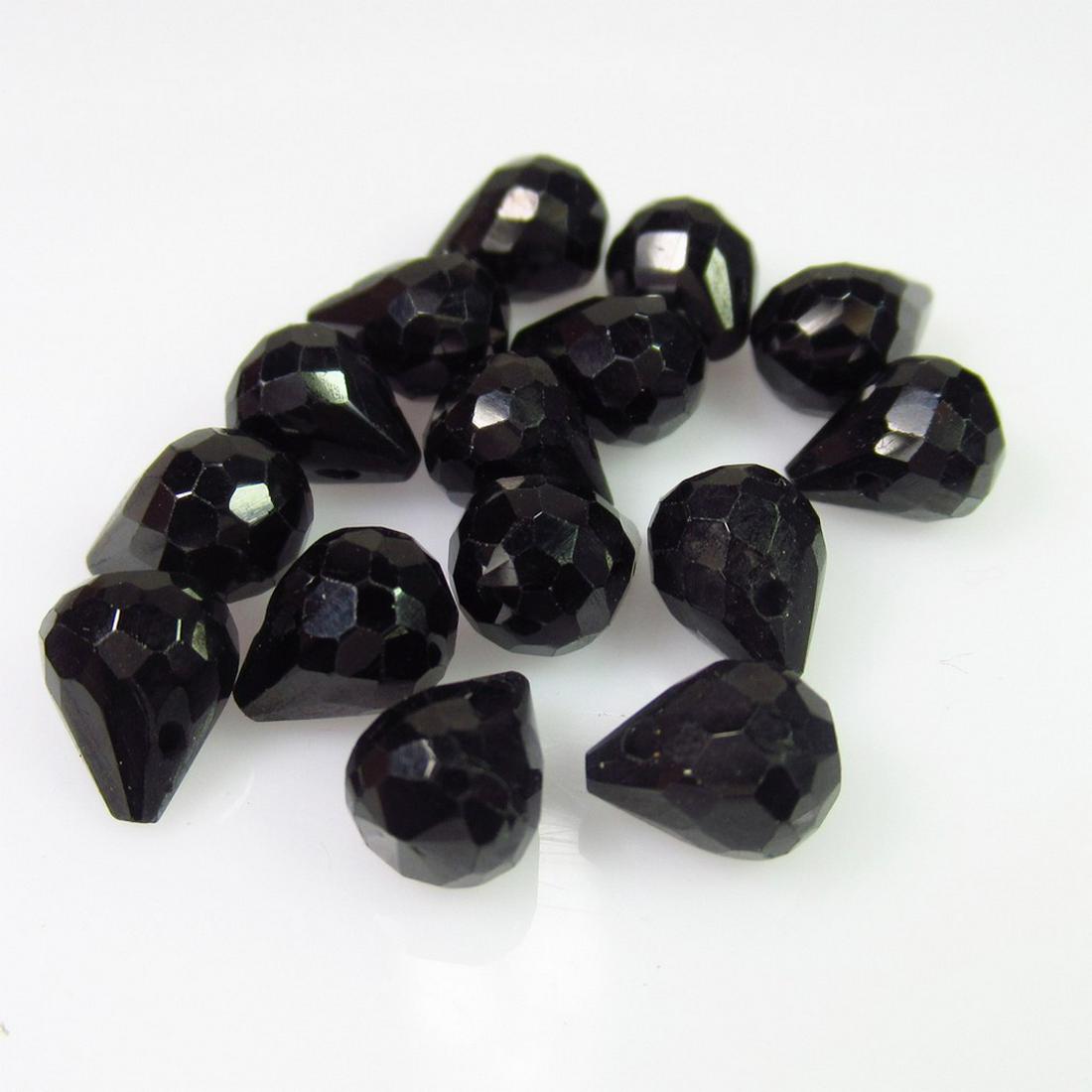 29.52 Ct Genuine 15 Drilled Black Spinel Pear Beads: No Reserve! Title: 29.52 Ct Genuine 15 Drilled Black Spinel Pear Beads Stone Clarity: Opaque Loose Gemstone: Natural Black Spinel Beads Carat Weights: 29.52 Size / Dimensions: 7.50 x 5.70 x 5.70 mm / 