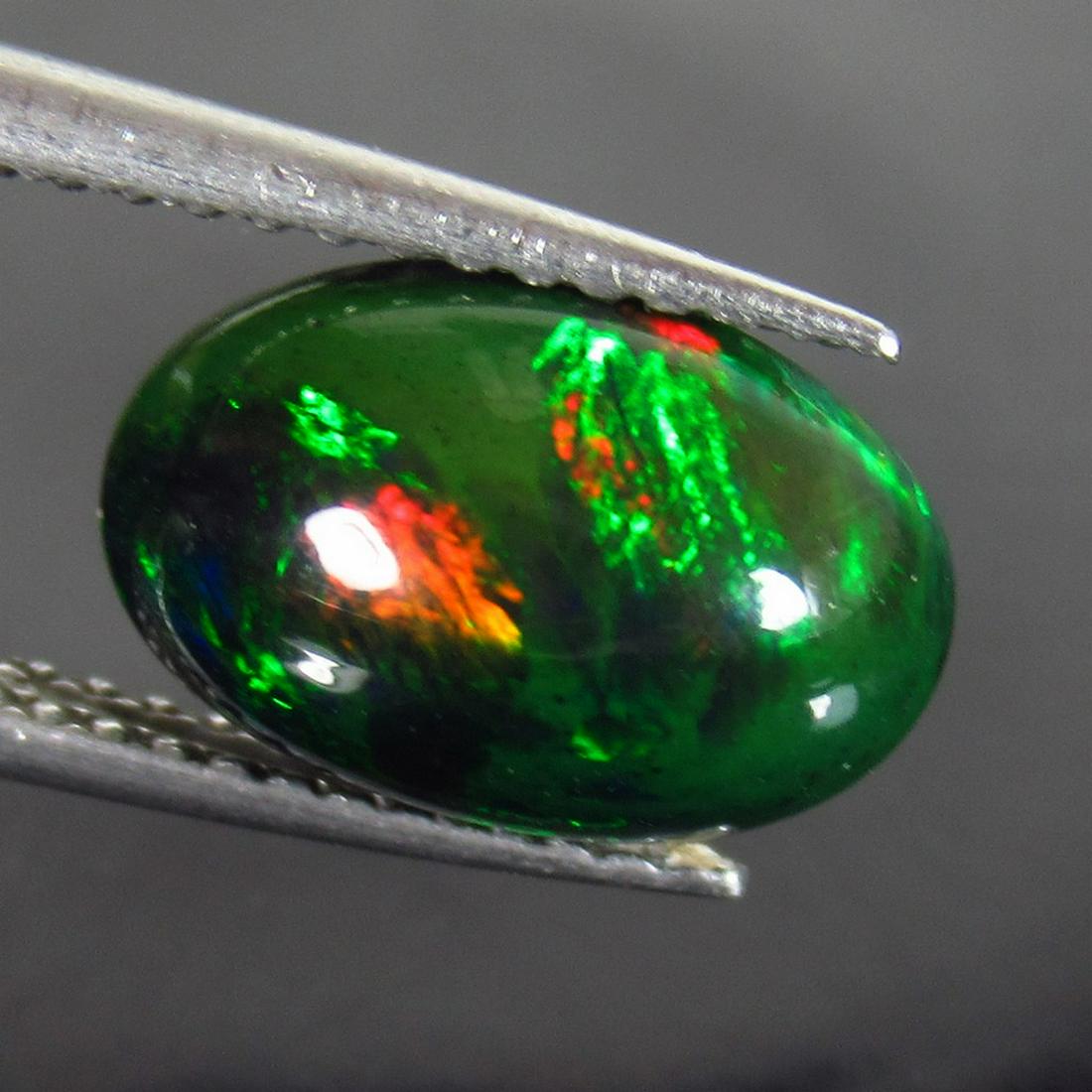 1.91 Ct Genuine Ethiopian Fire Black Opal Oval Cab (1 of 2)