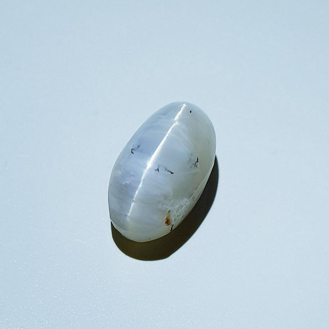4.90 ct Natural Opal Cat's Eye: No Reserve! Title: 4.90 ct Natural Opal Cat's Eye Color/Clarity: Semi Transparent Gemstones: Loosegemstone Carat Weights: 4.9 Size/Dimensions: 13.20 x 7.30 x 8.10 Additional Information: Oval - Africa