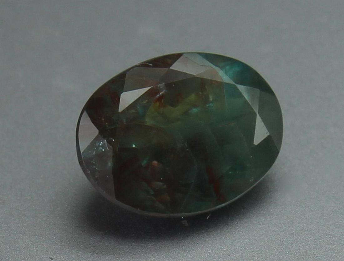 Alexandrite, 1.03 Ct: Title: Alexandrite, 1.03 Ct Color/Clarity: Green / Transparent Gemstone Type: Alexandrite Carat Weights: 1.03 Size/Dimensions: 6.9 x 5.2 x 3.2mm Additional Information: Without Certificate Reserve: $5