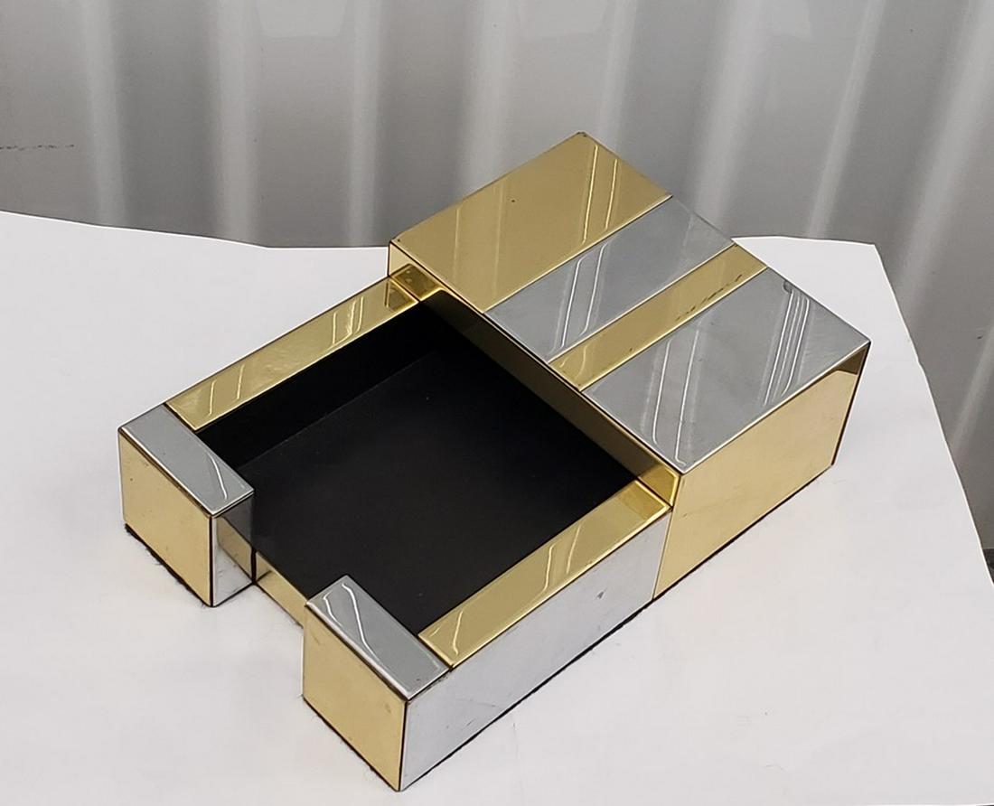 Paul Evan's desk accessory..memo pad box: Title: Paul Evan's desk accessory..memo pad box Date/Period: 1970s Materials: Brass/Chrome Dimensions: 7" x4 1/2" vintage memo pad box design by Paul Evans for Directional Reserve: $150.00 Shipping:
