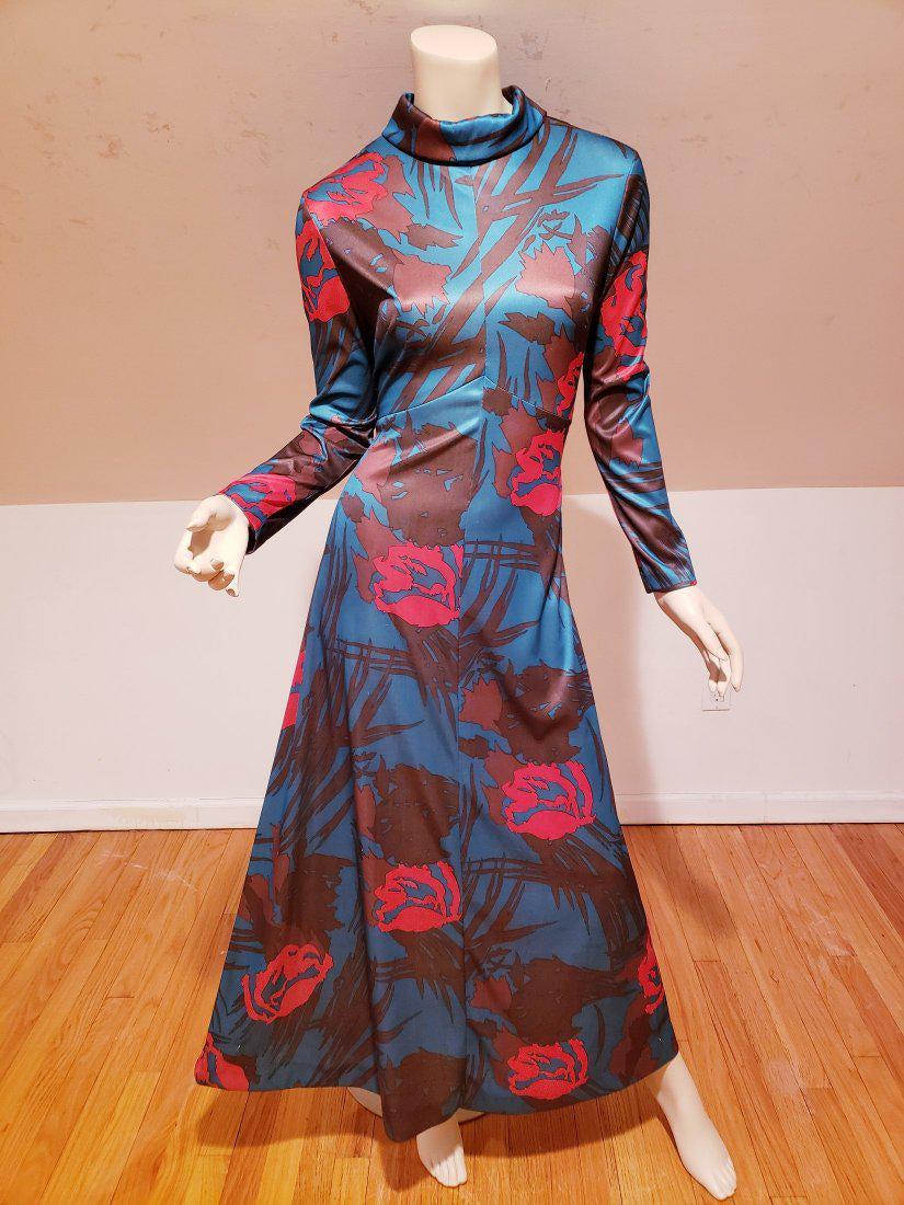 Emilio Borghese Italian Designer maxi 70s Designer gown: Gorgeous Flowy graceful maxi dress by Italian iconic Designr Emilio Borghese.Flows gracefuly from under the bustline sort of a demi Empire . Dramatic gentle sweep/A true beautyVibrant printed colors. 